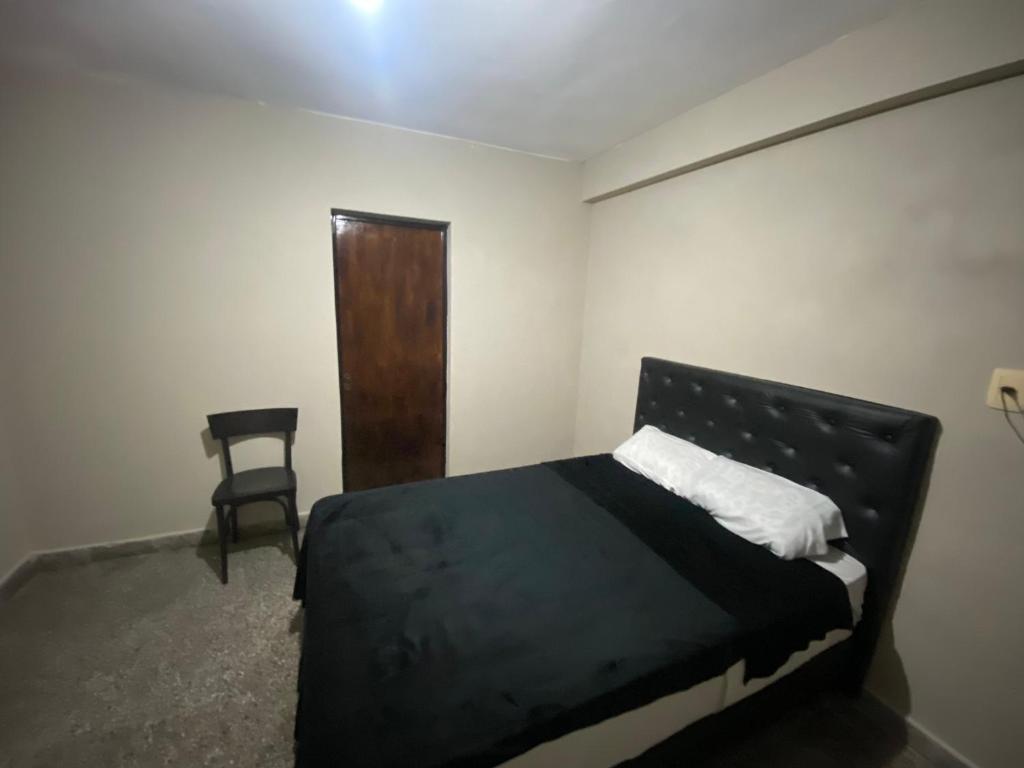 Postel nebo postele na pokoji v ubytování Urban Jungle Hostel