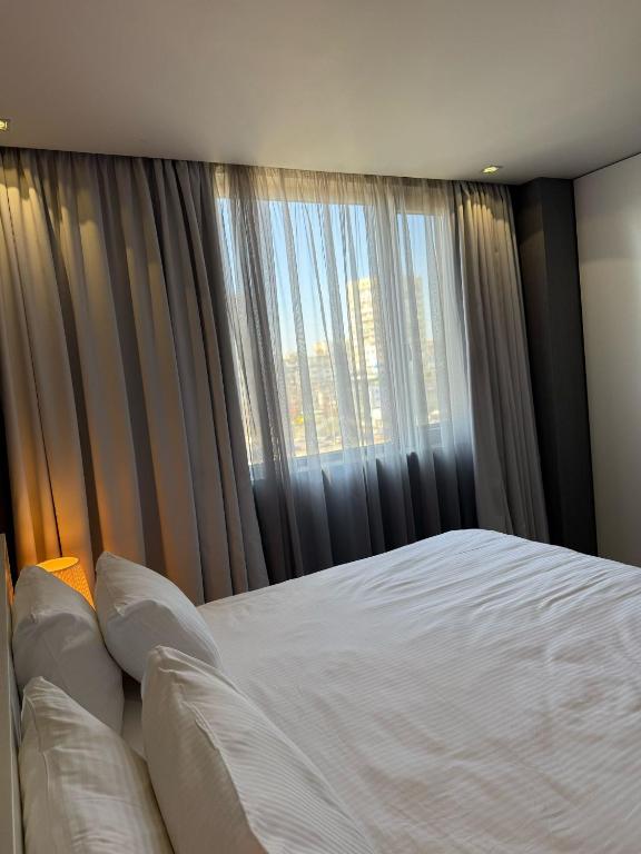 Postel nebo postele na pokoji v ubytování Boutique Hotel Kanyon