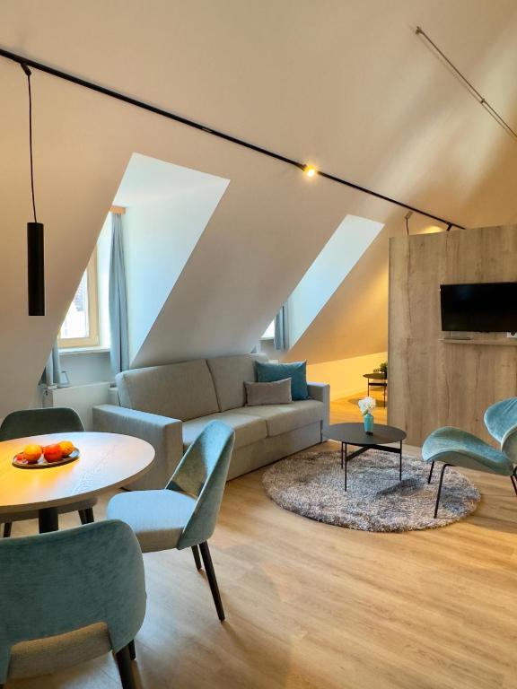 Posezení v ubytování Living & Serviced Apartments by Blauer Wolf