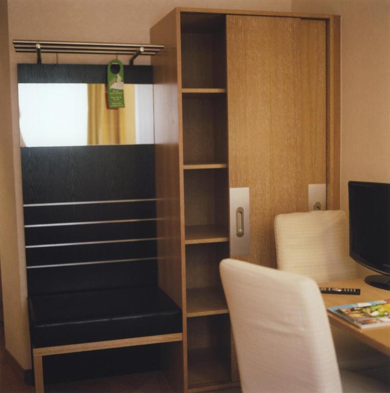 TV a/nebo společenská místnost v ubytování Hotel Jedermann