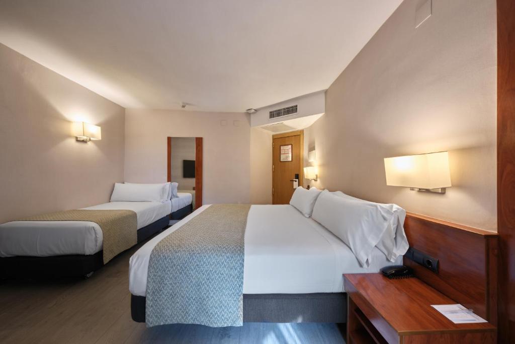 
Triple Room (2 Adults + 1 Child)
