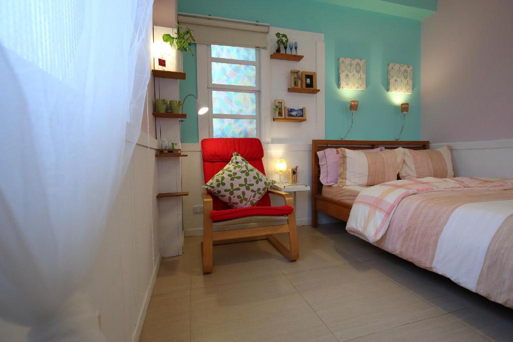 Postel nebo postele na pokoji v ubytování Huxi B&B