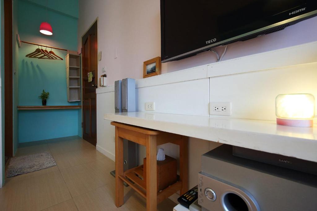 Kuchyň nebo kuchyňský kout v ubytování Huxi B&B