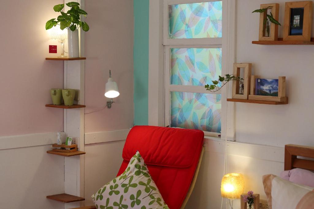 Postel nebo postele na pokoji v ubytování Huxi B&B