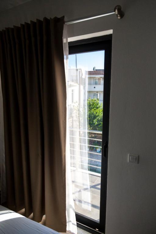 Ένα ή περισσότερα κρεβάτια σε δωμάτιο στο Apartments Bella Notte