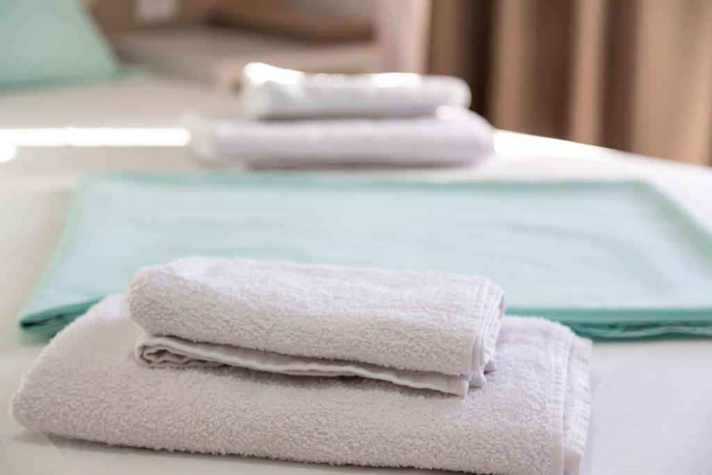 Ένα ή περισσότερα κρεβάτια σε δωμάτιο στο Apartments Bella Notte