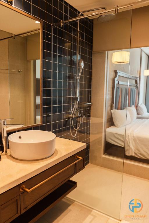 Phòng tắm tại Apec Mandala Cham Bay Mui Ne - Ruby Apartment