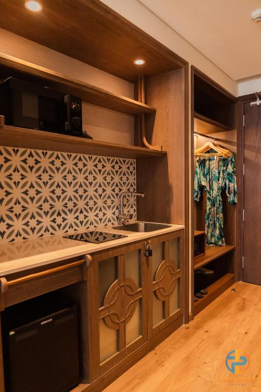 Nhà bếp/bếp nhỏ tại Apec Mandala Cham Bay Mui Ne - Ruby Apartment