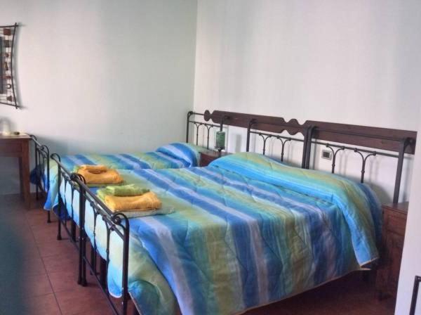 Cette chambre comprend 2 lits jumeaux. dans l'établissement B&B Spano', à Reggio de Calabre