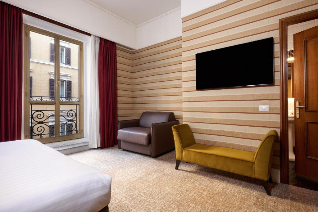 TV a/nebo společenská místnost v ubytování Hotel Mascagni