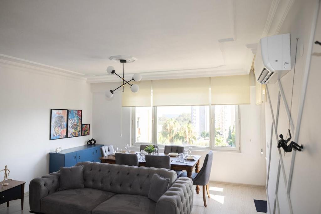 A television and/or entertainment centre at Melissas Suites Lara