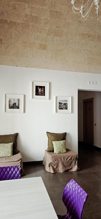 Łóżko lub łóżka w pokoju w obiekcie Nova Domus
