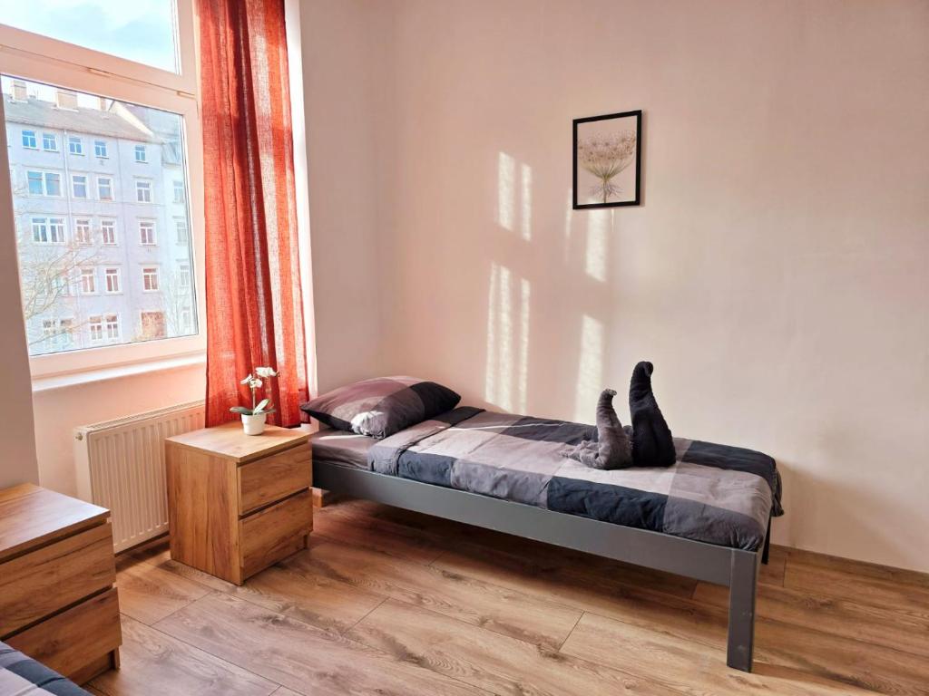 Postel nebo postele na pokoji v ubytování Hotel New Town