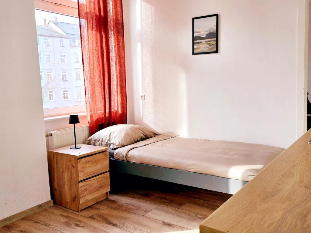 Postel nebo postele na pokoji v ubytování Hotel New Town
