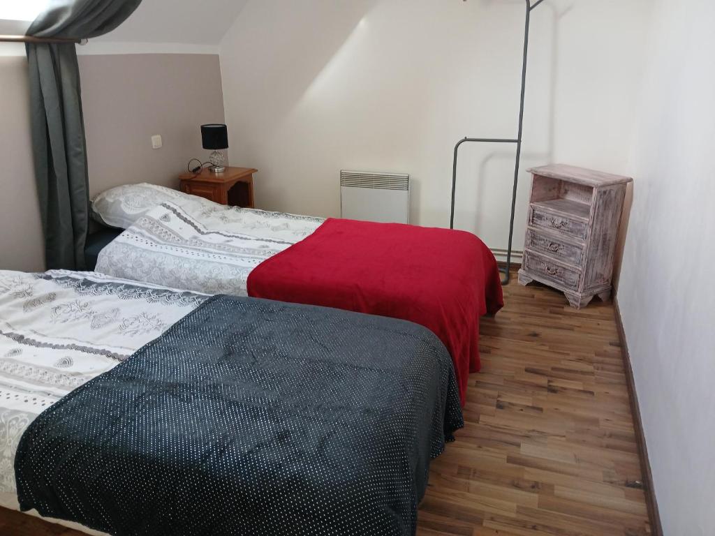 Postel nebo postele na pokoji v ubytování Domaine des Ifs