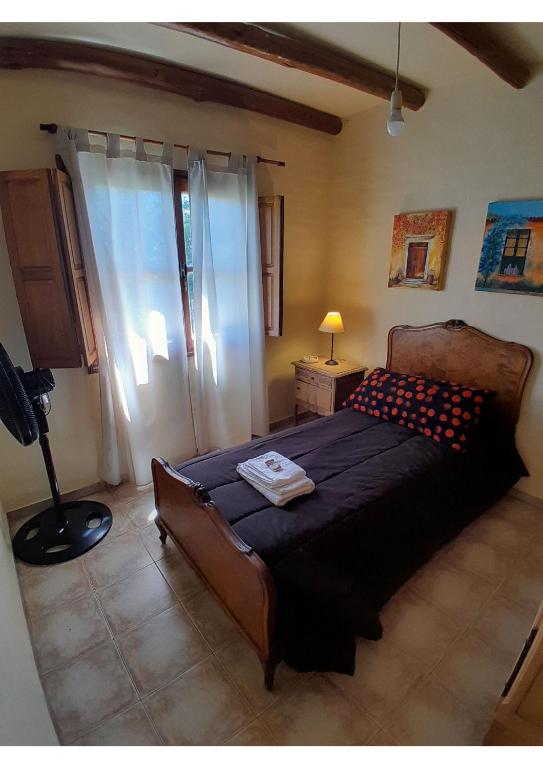 Postel nebo postele na pokoji v ubytování Casa La Naranja