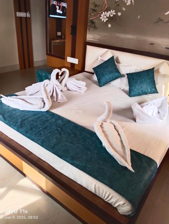 Postel nebo postele na pokoji v ubytování Hotel Panda