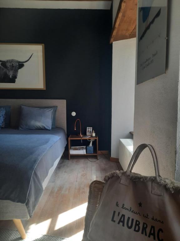 Postel nebo postele na pokoji v ubytování chambre d'hôtes Paulette et Pépin