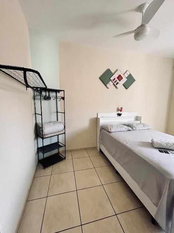 Katil atau katil-katil dalam bilik di Apt 02 Quartos Ouro Branco
