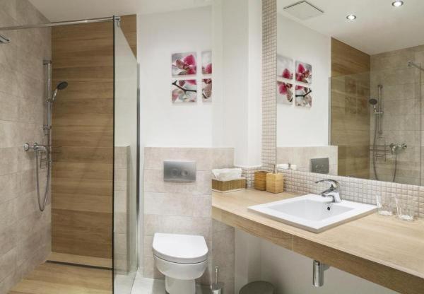 Kúpeľňa v ubytovaní Triton Apartments