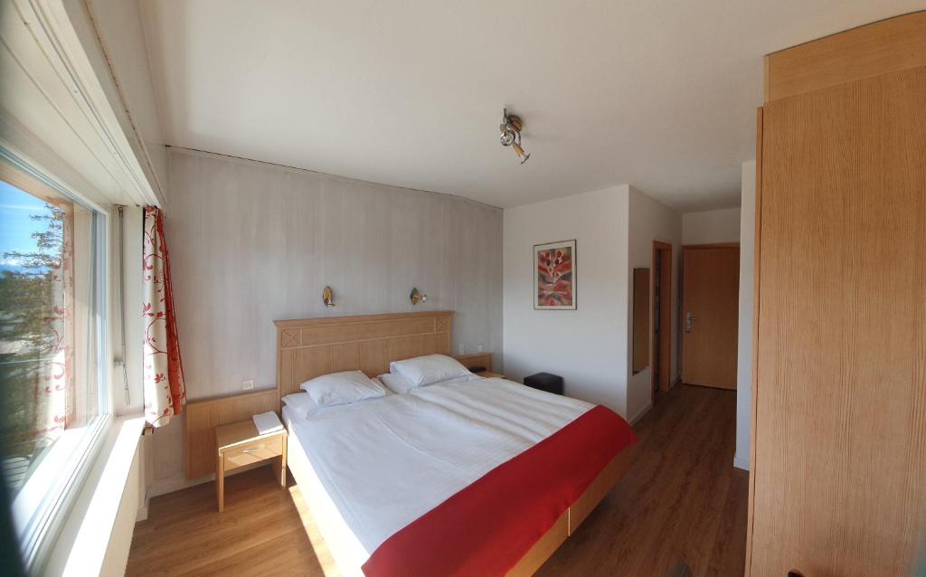 Postel nebo postele na pokoji v ubytování Hôtel Splendide