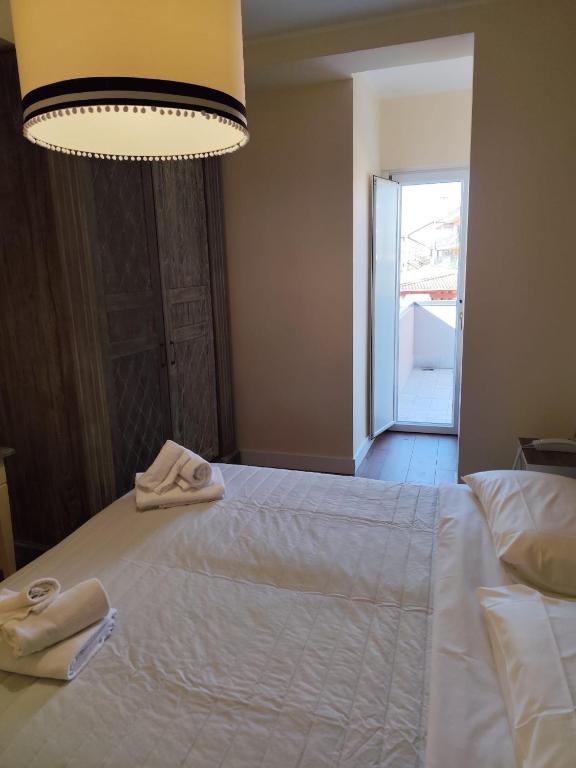 Postel nebo postele na pokoji v ubytování Hotel OC2