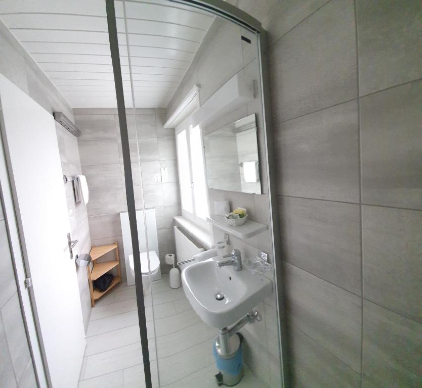 Koupelna v ubytování Hôtel Splendide