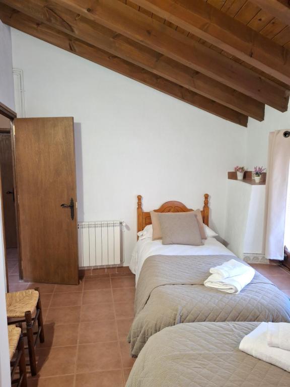 Postel nebo postele na pokoji v ubytování Cal Tonico Rural