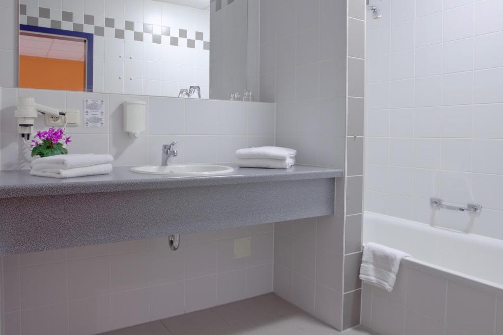 Koupelna v ubytování Hotel Strohofer