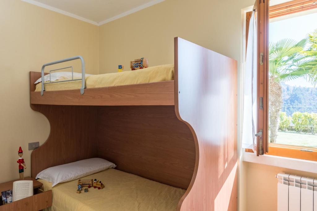 Postel nebo postele na pokoji v ubytování Residence La Berna