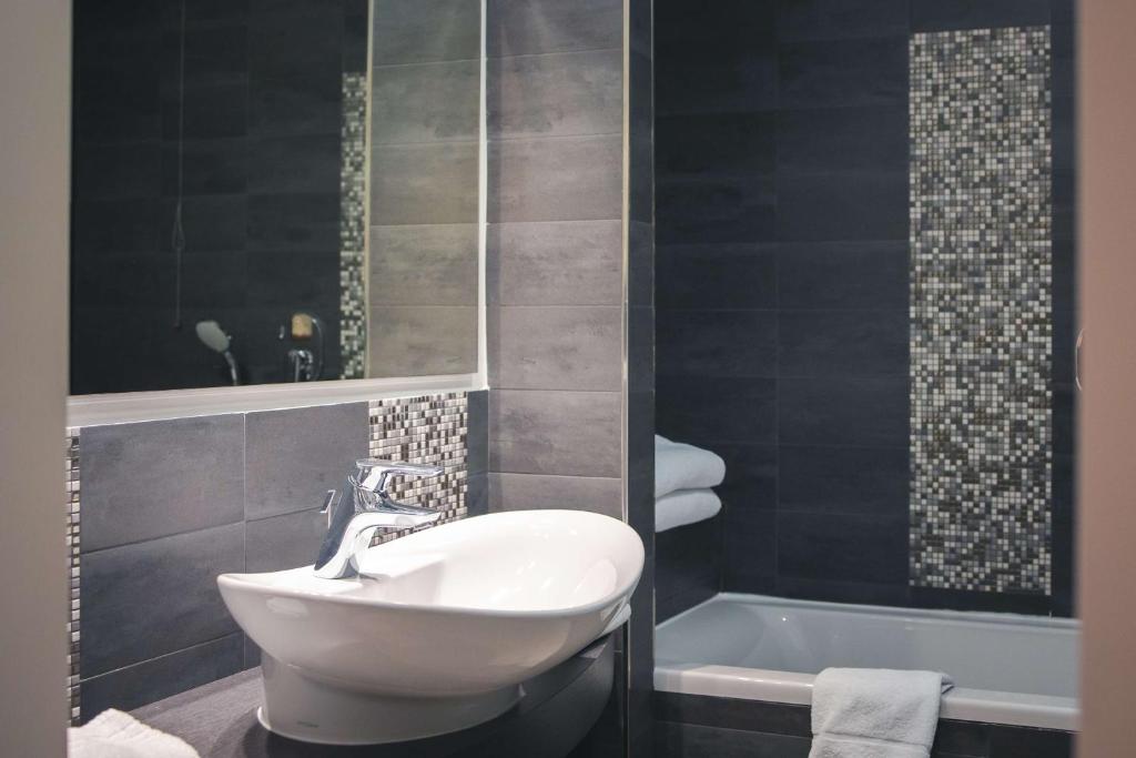 Kúpeľňa v ubytovaní Best Western Mirage Hotel Fiera