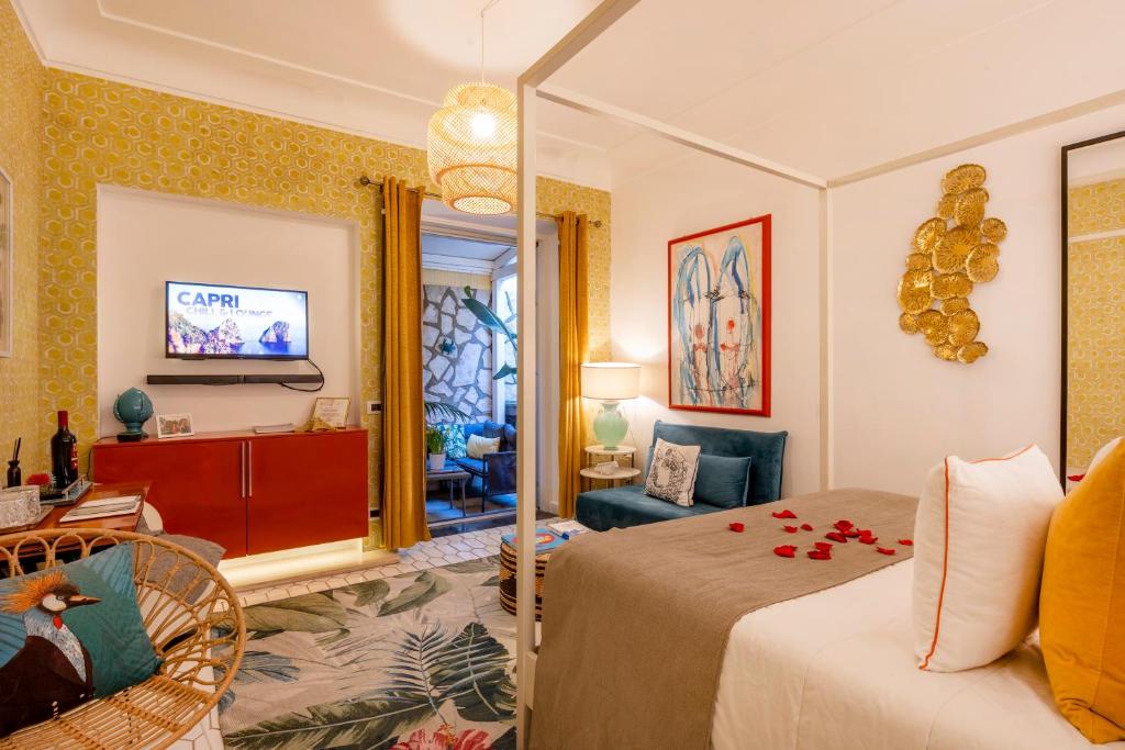 Posteľ alebo postele v izbe v ubytovaní Suite Apartment Capri con Jacuzzi in Piazzetta