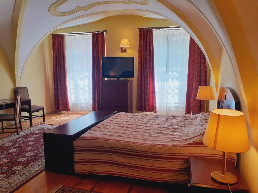 Postel nebo postele na pokoji v ubytování Hotel Casa Wagner