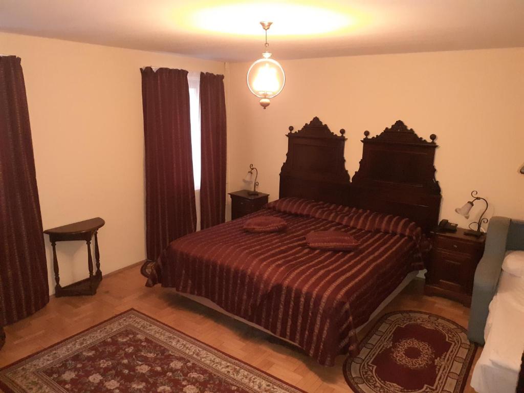 Postel nebo postele na pokoji v ubytování Hotel Casa Wagner