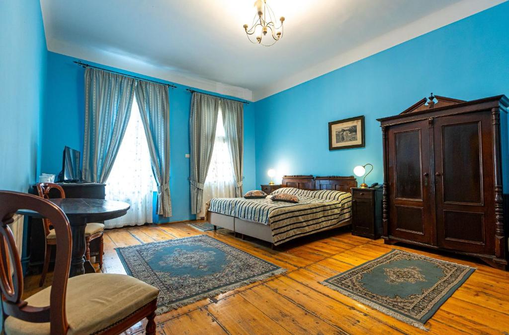 Postel nebo postele na pokoji v ubytování Hotel Casa Wagner