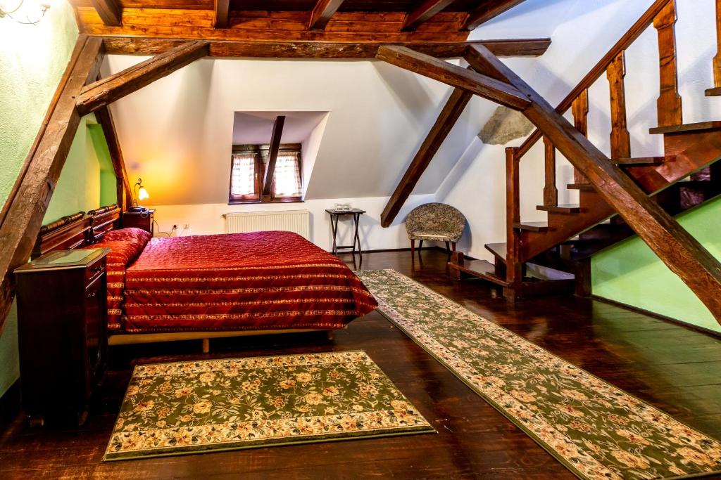 Postel nebo postele na pokoji v ubytování Hotel Casa Wagner