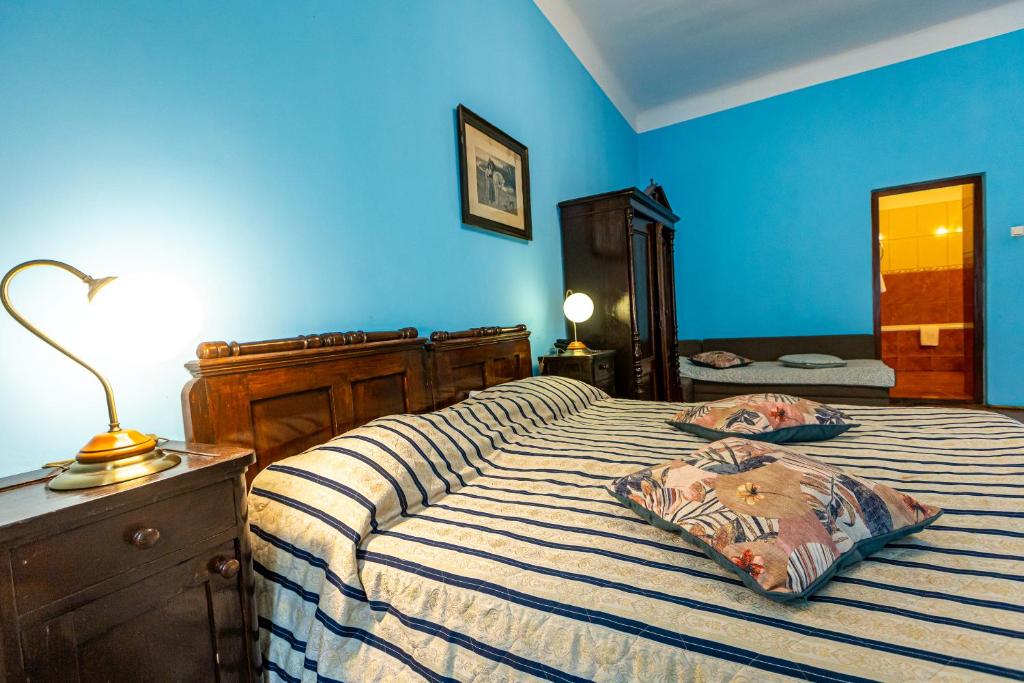 Postel nebo postele na pokoji v ubytování Hotel Casa Wagner