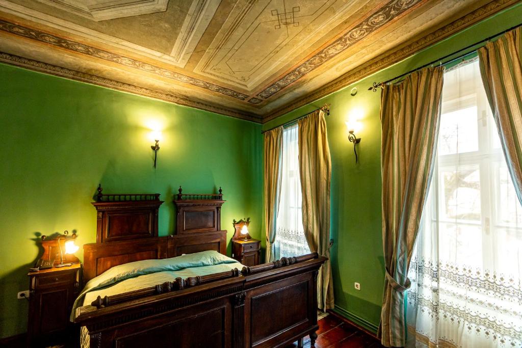 Postel nebo postele na pokoji v ubytování Hotel Casa Wagner