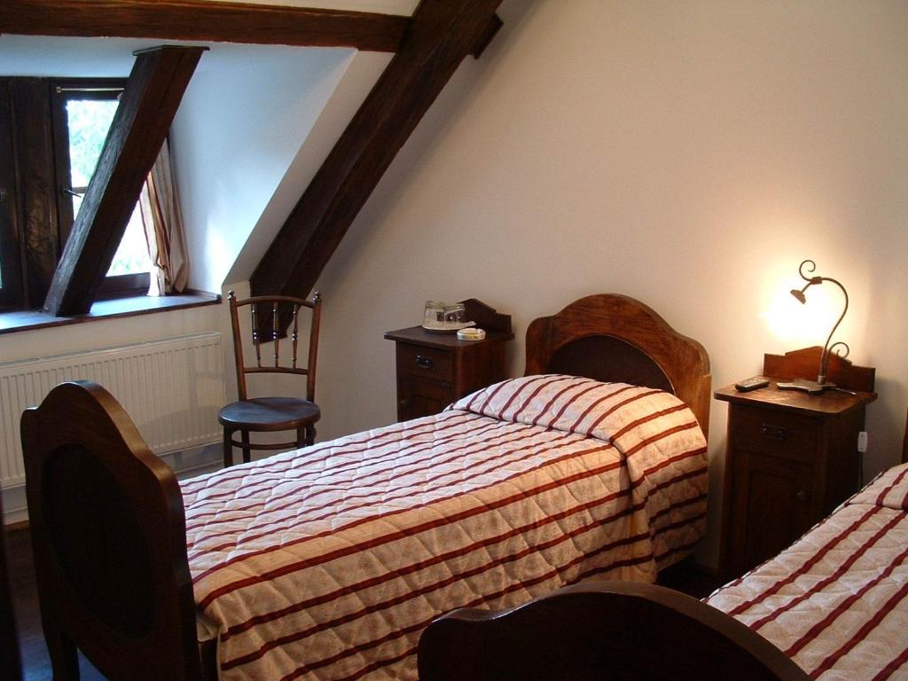 Postel nebo postele na pokoji v ubytování Hotel Casa Wagner