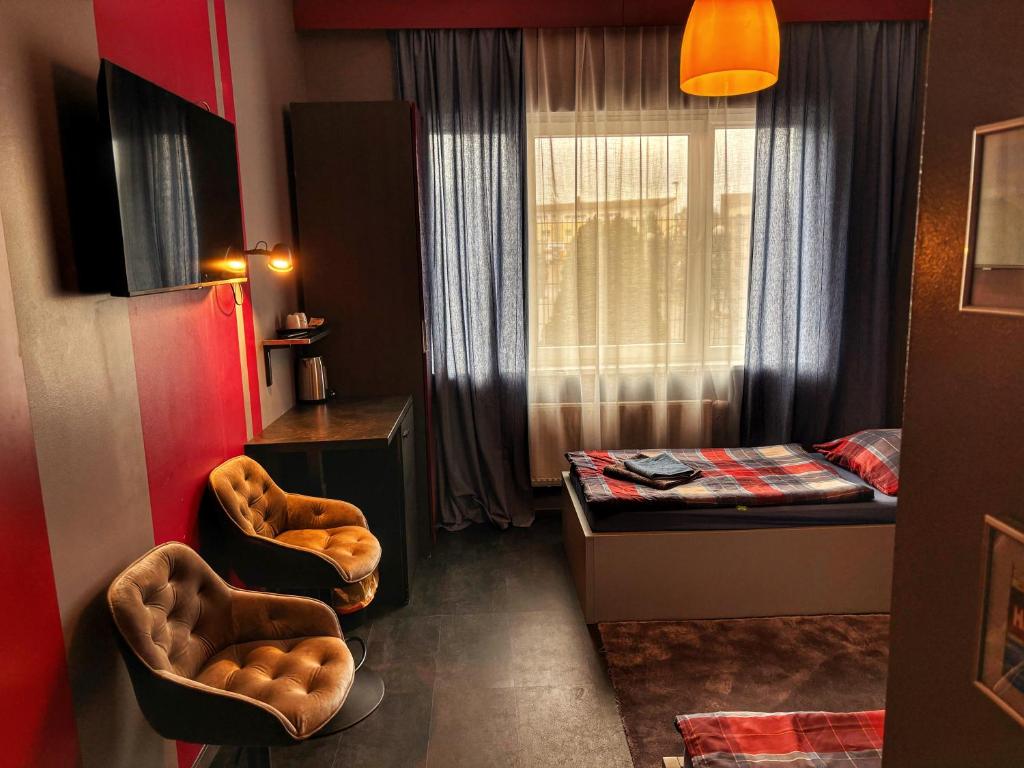 Postel nebo postele na pokoji v ubytování Hotel 108
