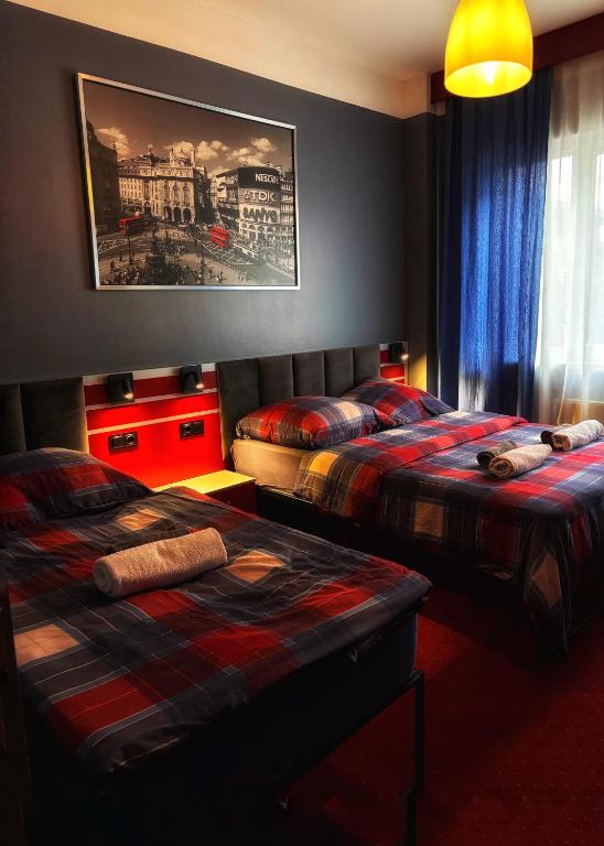 Postel nebo postele na pokoji v ubytování Hotel 108
