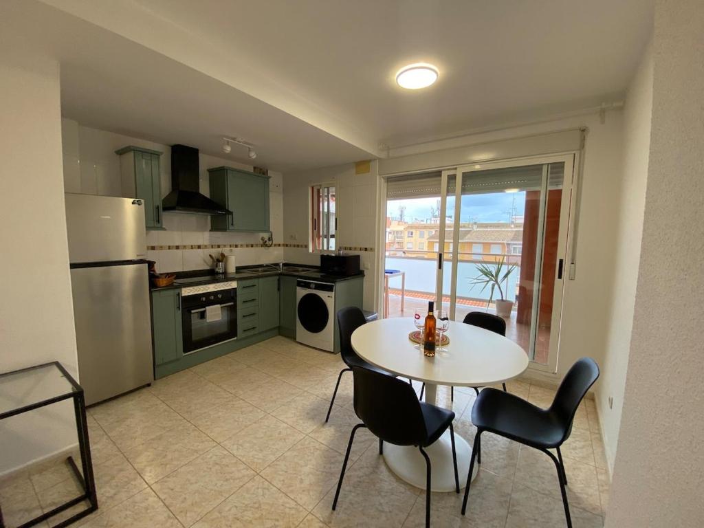 Kuchyň nebo kuchyňský kout v ubytování Apartamento playa de chilches