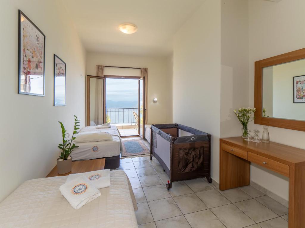 Postel nebo postele na pokoji v ubytování Sunset Hotel