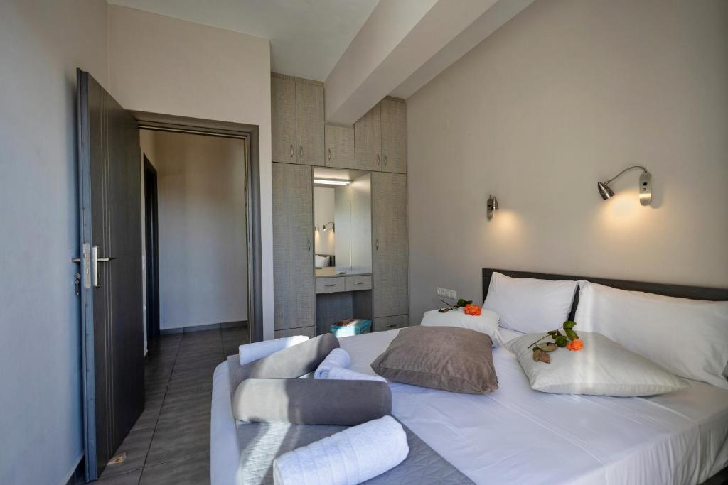 Posteľ alebo postele v izbe v ubytovaní Akrotiri Panorama- luxury rental apartments with sea view