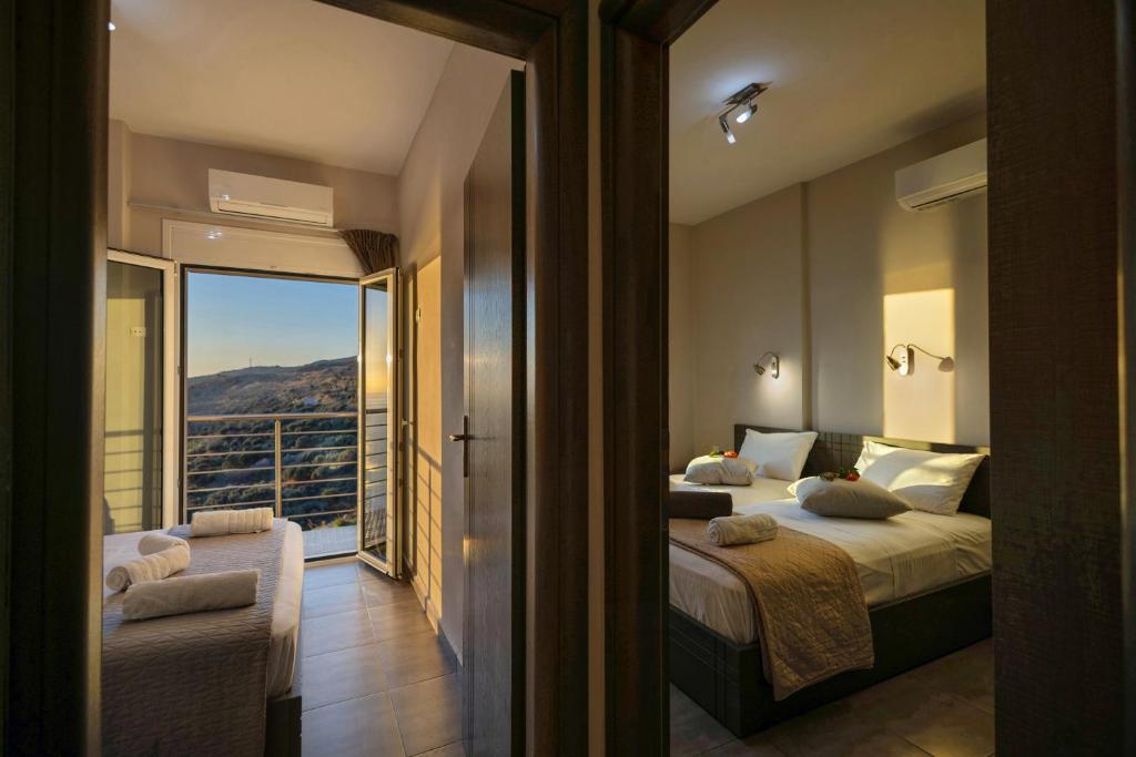 Posteľ alebo postele v izbe v ubytovaní Akrotiri Panorama- luxury rental apartments with sea view