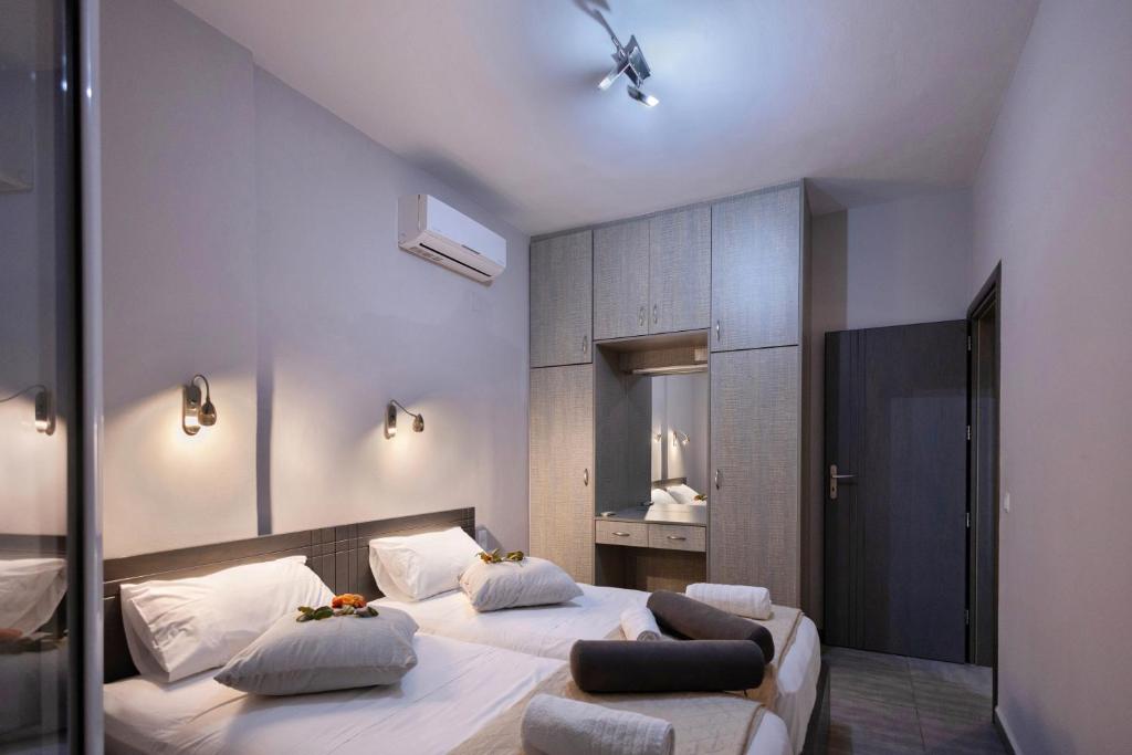 Posteľ alebo postele v izbe v ubytovaní Akrotiri Panorama- luxury rental apartments with sea view