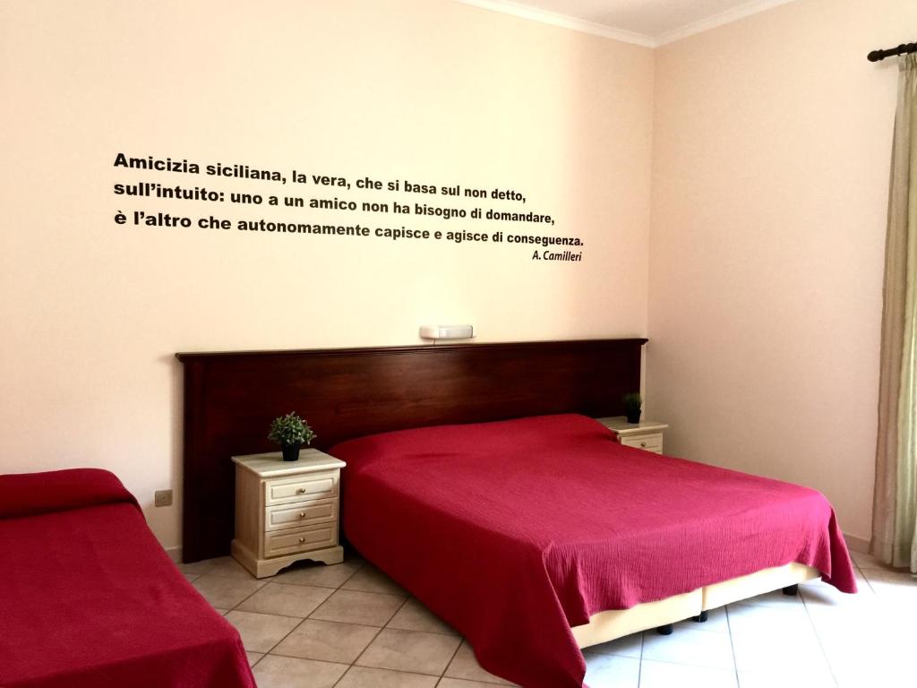 Posteľ alebo postele v izbe v ubytovaní Mamamia #Lipari