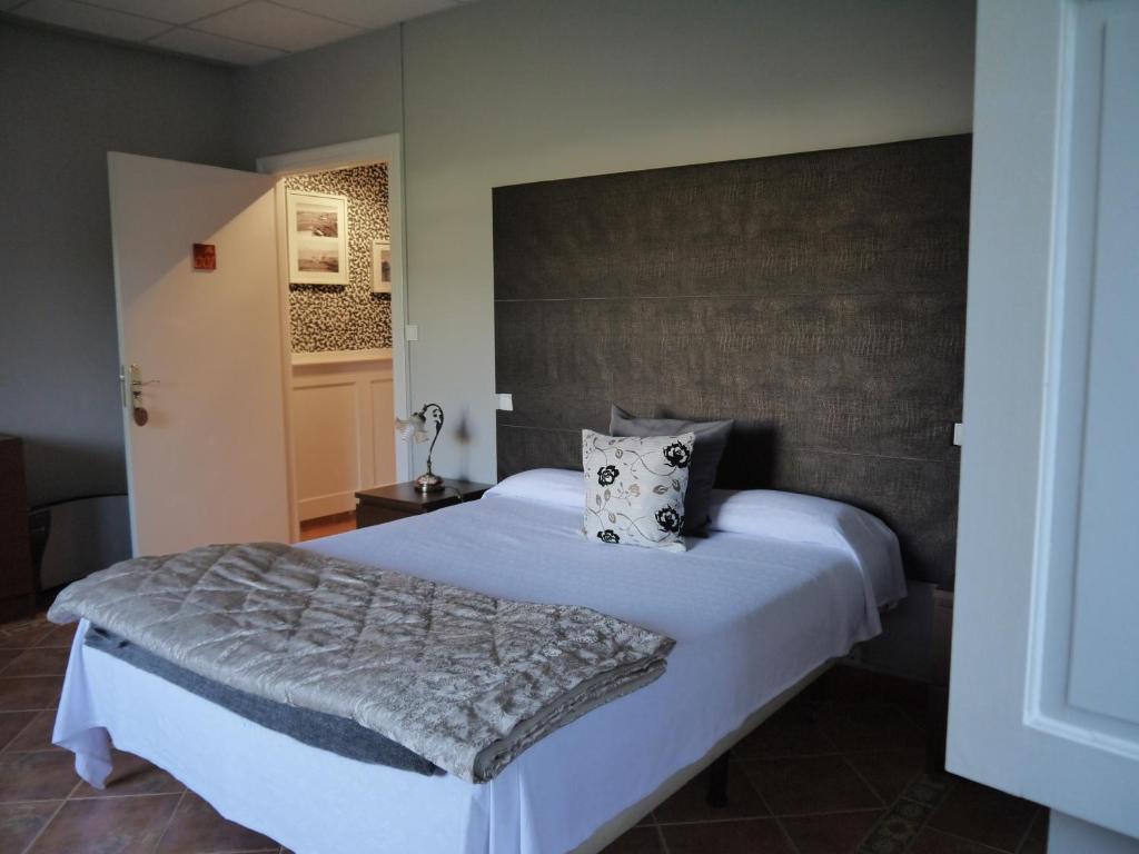 Voodi või voodid majutusasutuse Hotel Rural Isasi toas