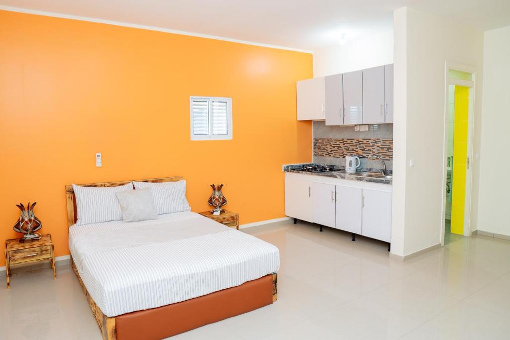 Kuchyň nebo kuchyňský kout v ubytování J Martins ApartHotel