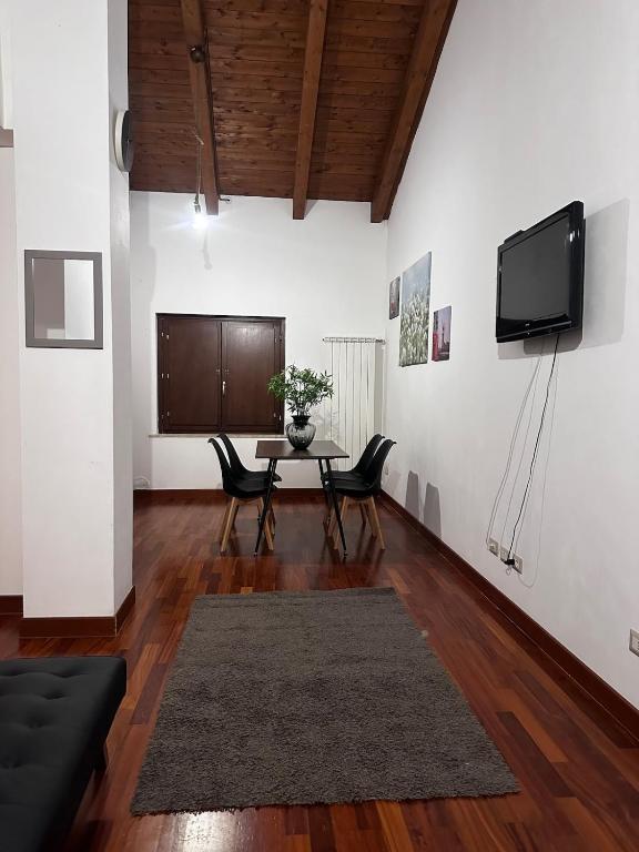 TV a/nebo společenská místnost v ubytování Casa Camelia